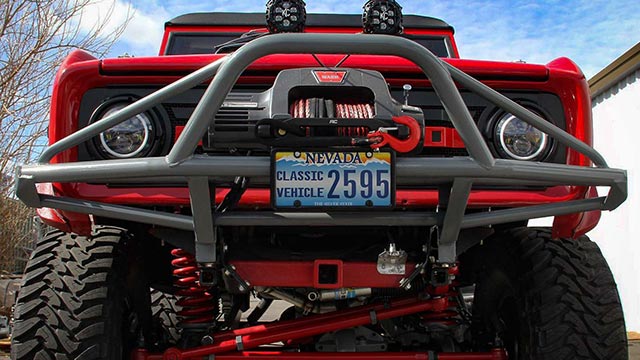 Truck with off-road bumper and accessories at High Rollin Customs